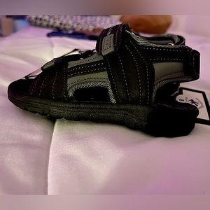 Toddler Size 8  sandals with Velcro and durable tread.